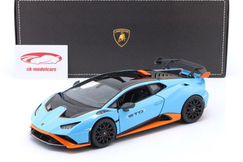 Lamborghini Huracan STO Año de construcción 2021 Azul claro / naranja / negro 1:18 Rastar
