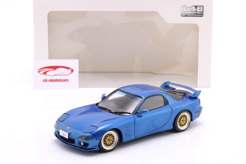 Mazda RX-7 tipo RS (FD3S) Ano de construção 1999 azul metálico 1:18 Solido