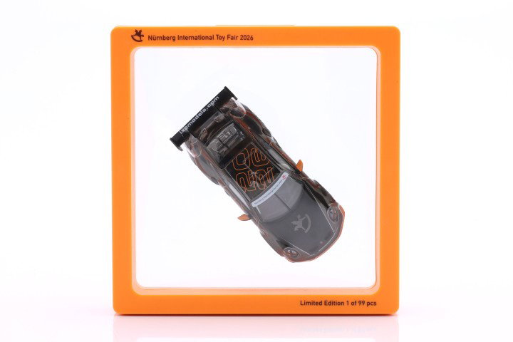Porsche 911 (992) GT3 Cup Legetøjsmesse Nürnberg 2026 sort / orange 1:64 Ixo