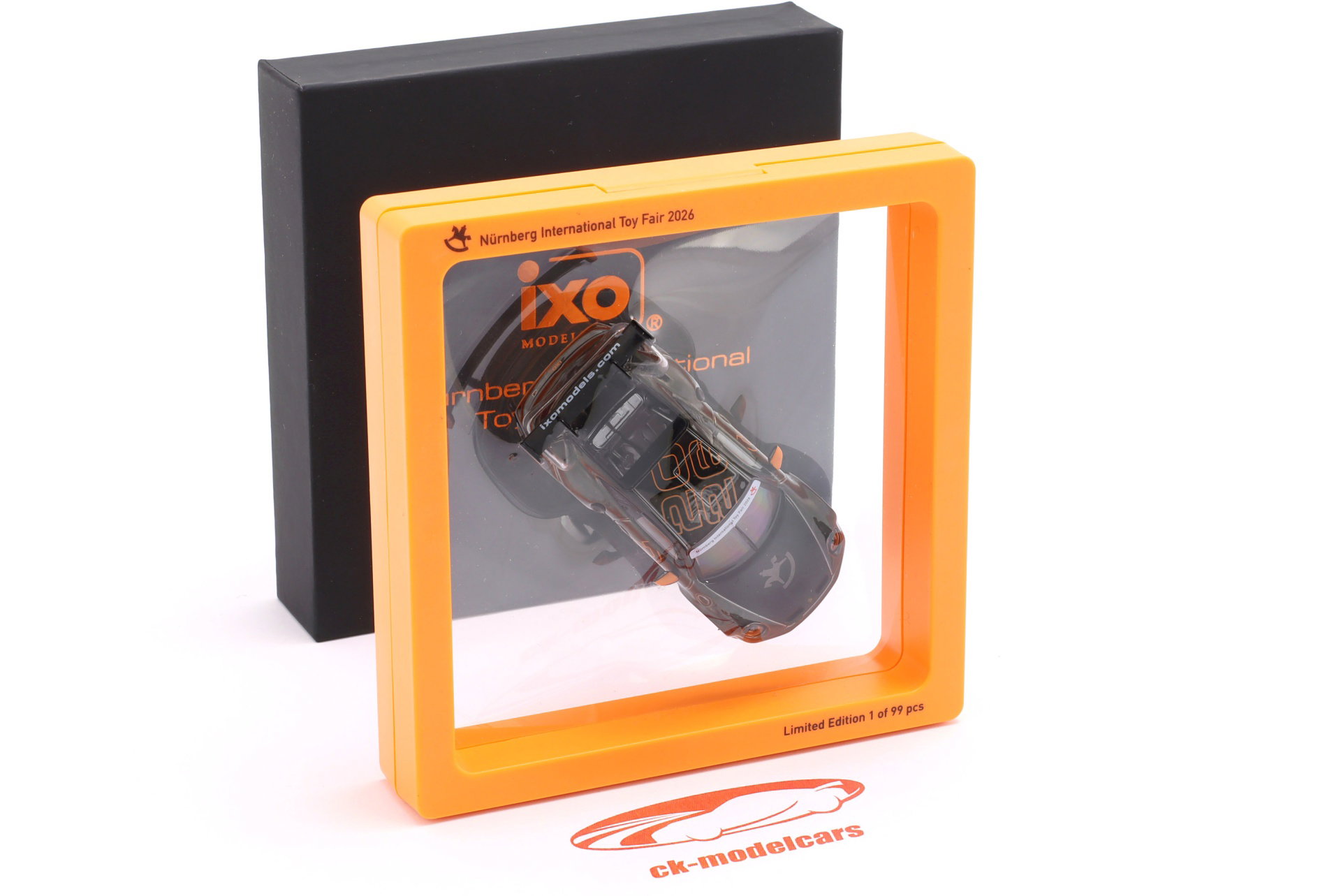 Porsche 911 (992) GT3 Cup Legetøjsmesse Nürnberg 2026 sort / orange 1:64 Ixo