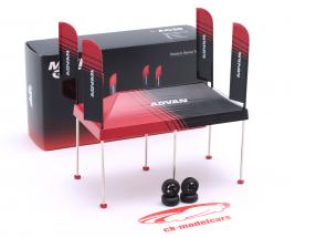 Paddock Tenda di servizio Advan nero / rosso 1:64 TrueScale
