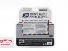 International DuraStar Flatbed USPS Bouwjaar 2013 wit met figuur postbode 1:64 Greenlight