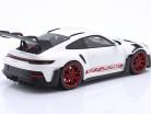 Porsche 911 (992) GT3 RS year 2022 white / red rims 1:18 Minichamps