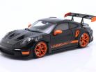 Porsche 911 (992) GT3 RS Année de construction 2022 noir / orange jantes 1:18 Minichamps