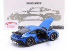 Porsche 911 (992) Dakar Bouwjaar 2022 blauw 1:18 Minichamps