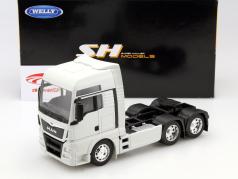 MAN TGX (6x4) белый 1:32 Welly