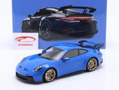 Porsche 911 (992) GT3 2021 haai blauw / gouden velgen 1:18 Minichamps