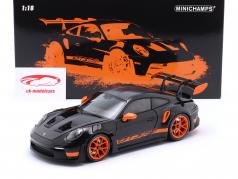 Porsche 911 (992) GT3 RS Byggeår 2022 sort / orange fælge 1:18 Minichamps