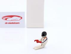 Сидящий Фигурка гонщика 1977 с черный шлем 1:18 FigurenManufaktur