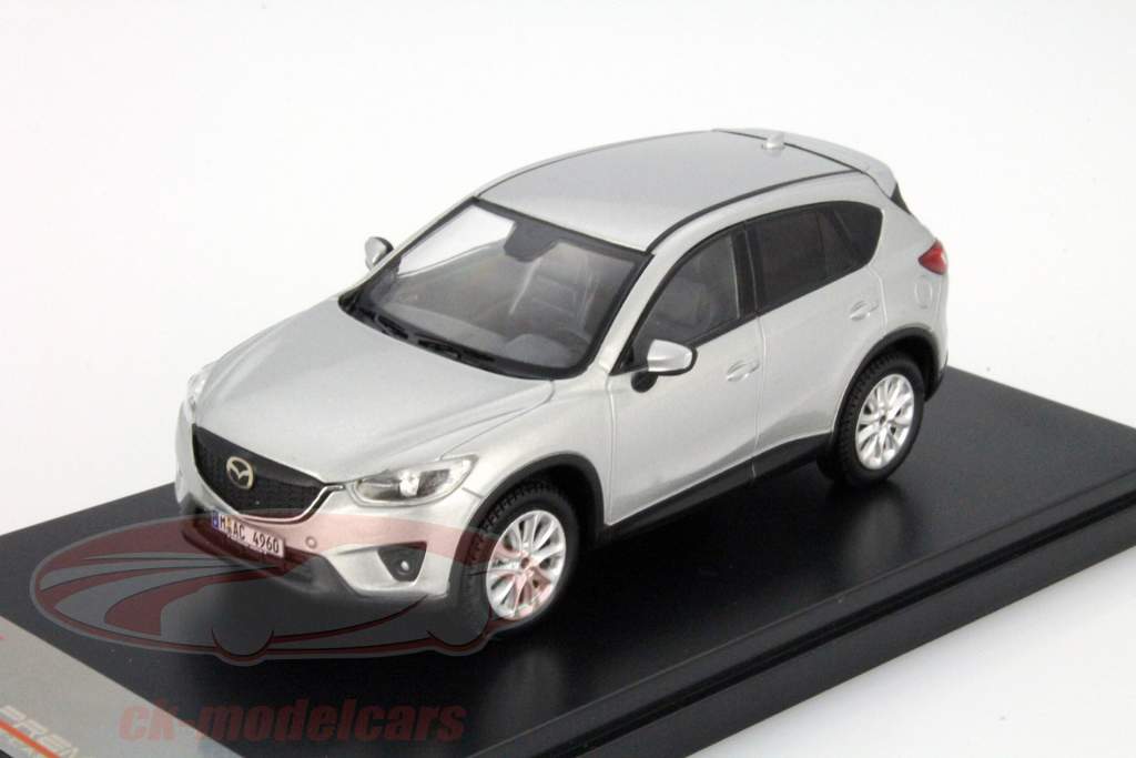 Mazda CX-5 год 2012 серебро металлический 1:43 Premium X