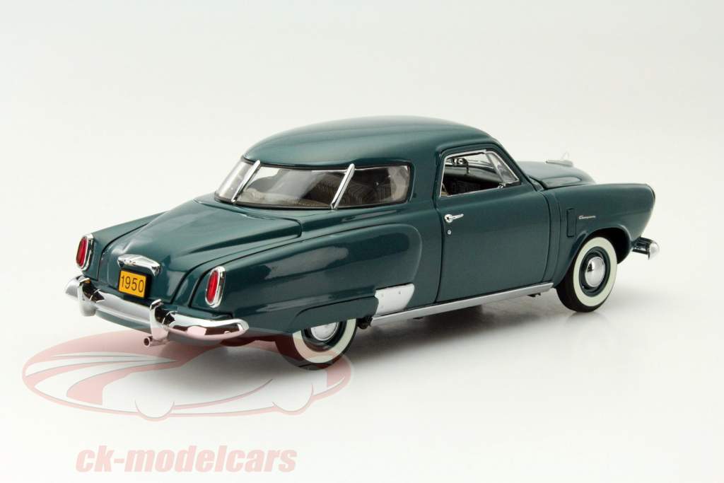 Stundebaker Champion Coupe Год 1950 темно-зеленый 1:24 Danbury Mint