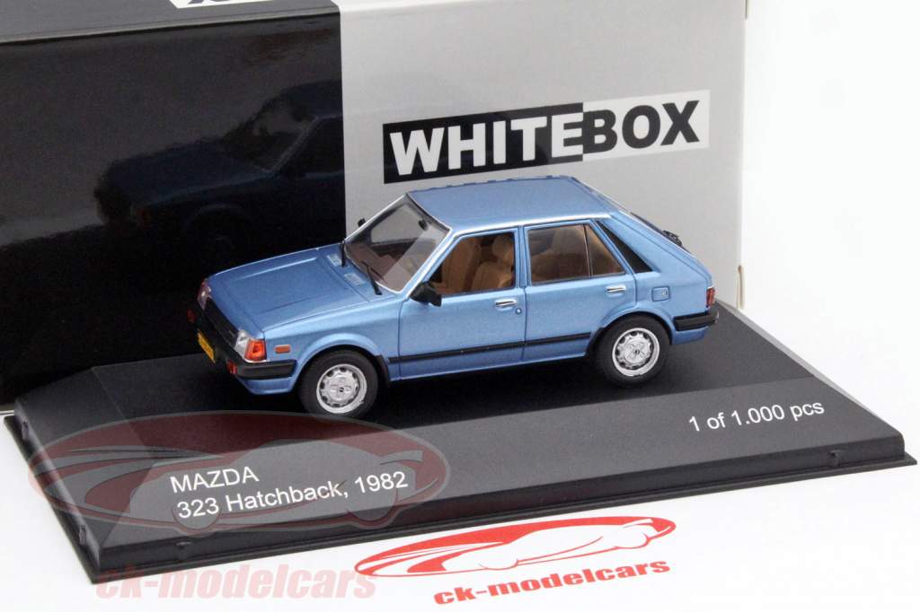Mazda 323 Hatchback 年 1982 ブルー 1:43 WhiteBox