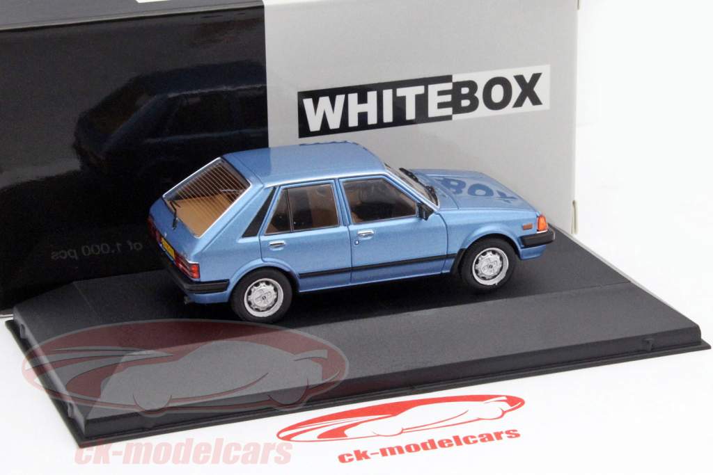 Mazda 323 Hatchback año 1982 azul 1:43 WhiteBox