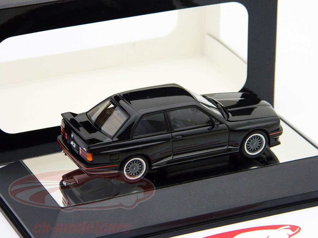 BMW M3 Sport Evolution 1990 AutoArt noir / blanc 1:43