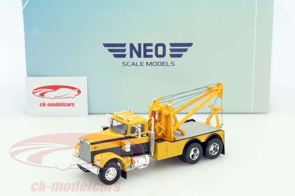 Diamond Rea буксировать грузовой автомобиль желтый / черный 1:43 Neo