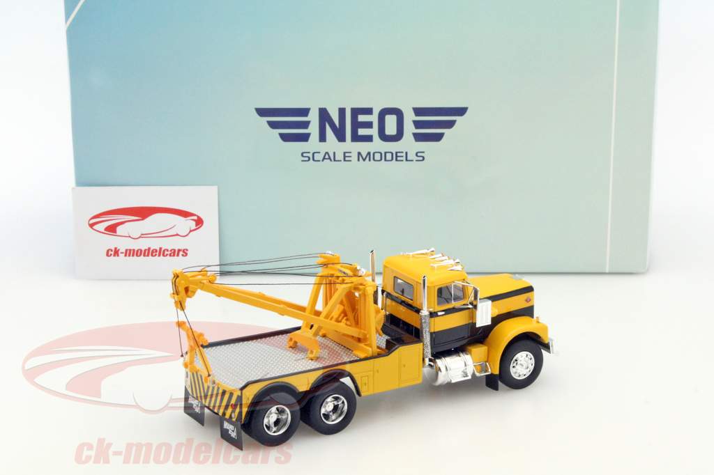 Diamond Rea буксировать грузовой автомобиль желтый / черный 1:43 Neo