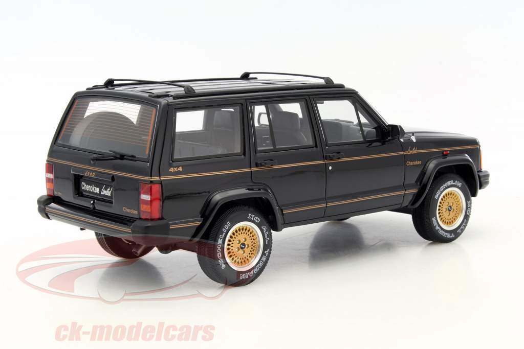 Jeep Cherokee Limited год 1983 черный 1:18 OttOmobile