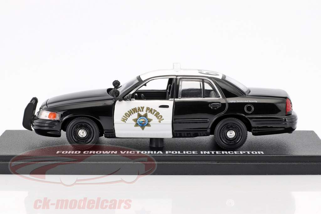 Ford Crown Victoria Police Interceptor Bouwjaar 2008 zwart / wit 1:43 Greenlight