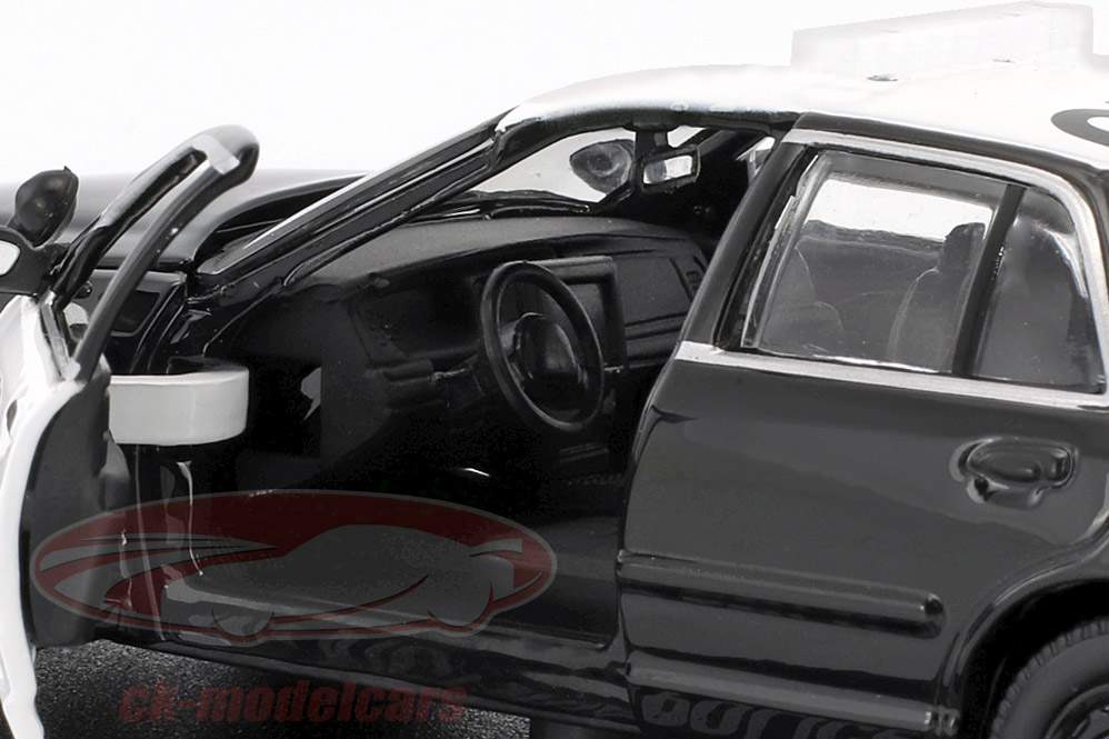 Ford Crown Victoria Police Interceptor Bouwjaar 2008 zwart / wit 1:43 Greenlight