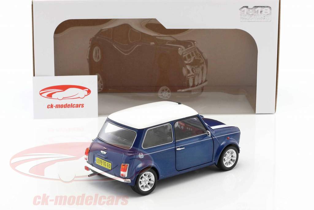 Mini Cooper 1.3i Sport Pack 建造年份 1997 蓝 金属的 / 白 1:18 Solido