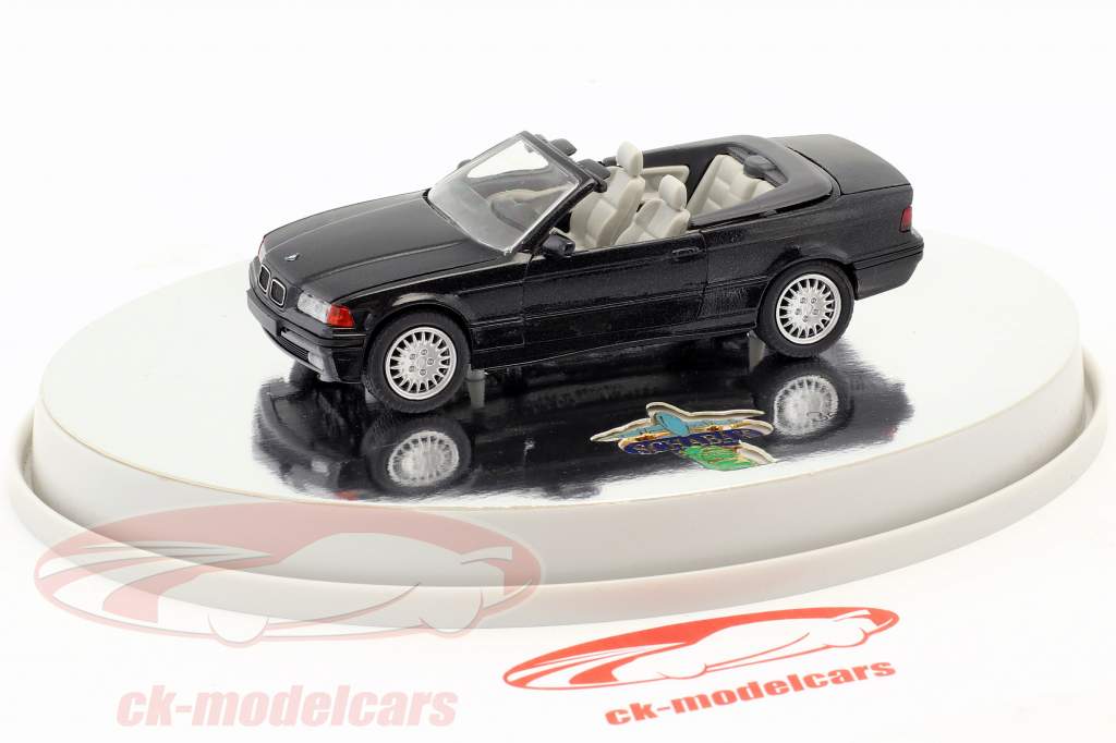 BMW 3er (E36) Cabriolet ano de construção 1993 – 1996 preto metálico com branco interior 1:43 Schabak