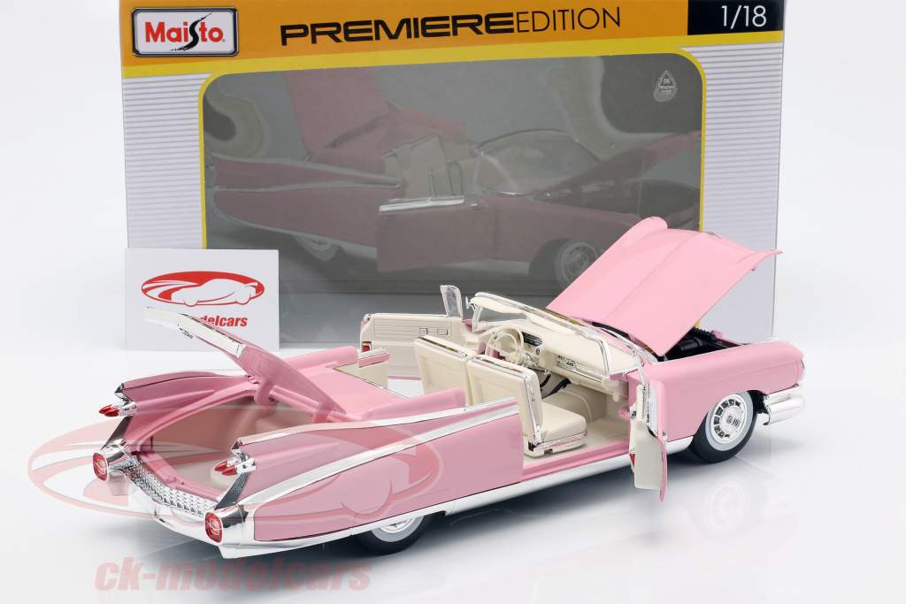Cadillac Eldorado Biarritz Jaar 1959 roze 1:18 Maisto