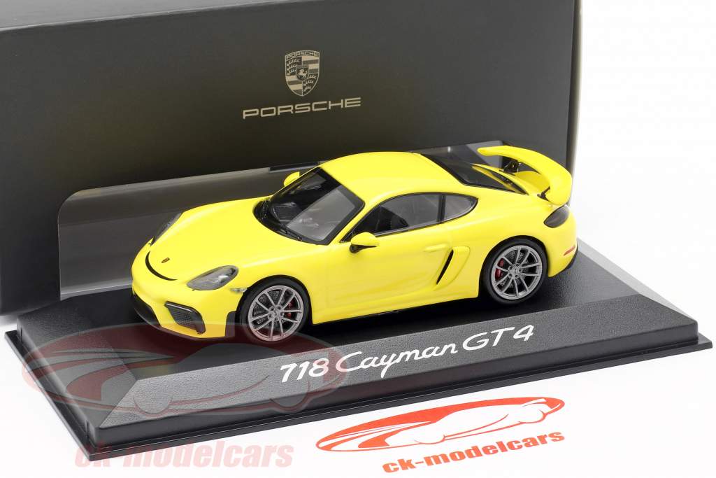 Porsche 718 (982) Cayman GT4 Jaar 2019 geel 1:43 Minichamps