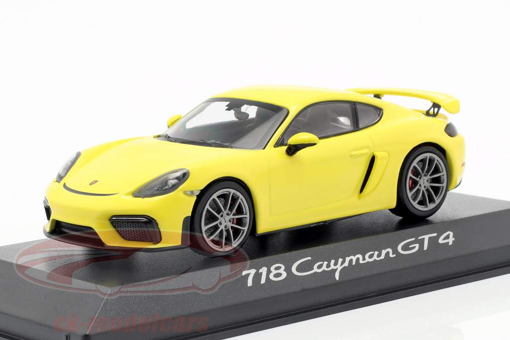 Porsche 718 (982) Cayman GT4 Jaar 2019 geel 1:43 Minichamps
