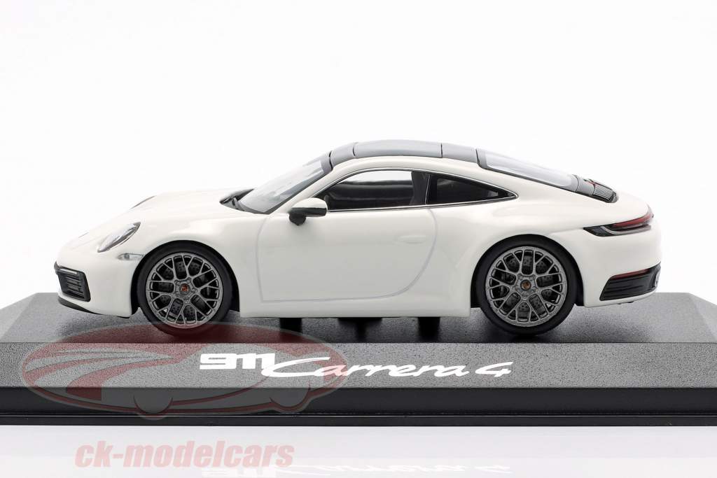 Porsche 911 (992) Carrera 4 white / black 1:43 Minichamps