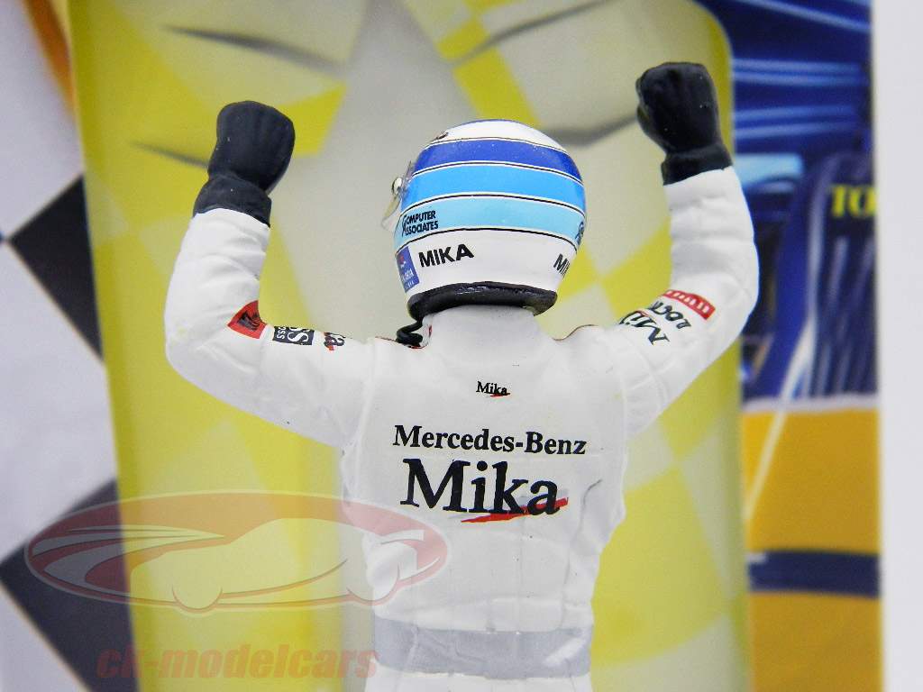 Mika Hakkinen chauffeur chiffre Formula 1 World Championship gagnant Faust debout 1:18 TopMo