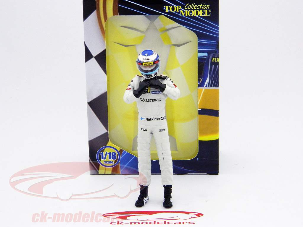 Mika Hakkinen figure formula 1 world champion standing ready to race 1:18 TopMo