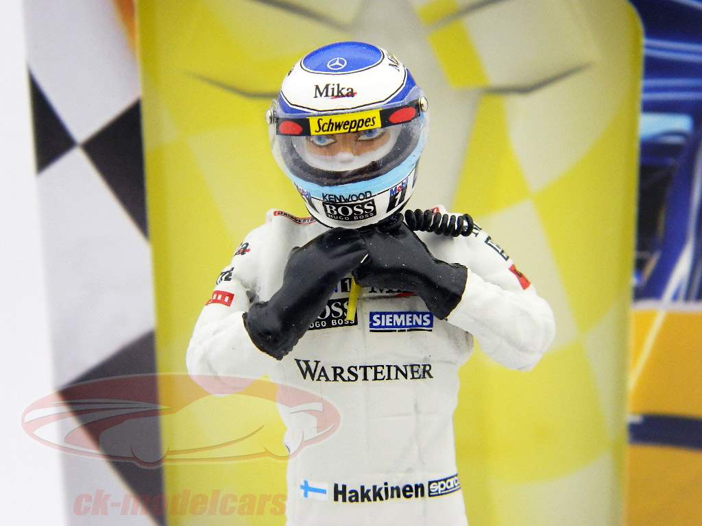 Mika Hakkinen figure formula 1 world champion standing ready to race 1:18 TopMo