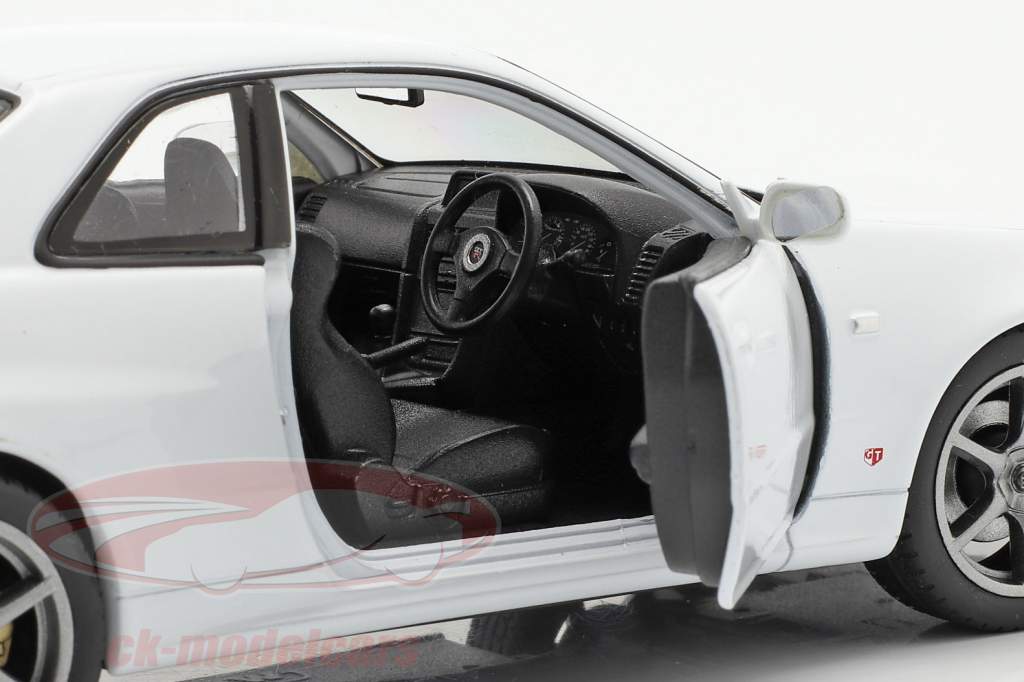 Nissan Skyline GT-R (R34) blanc 1:24 Welly