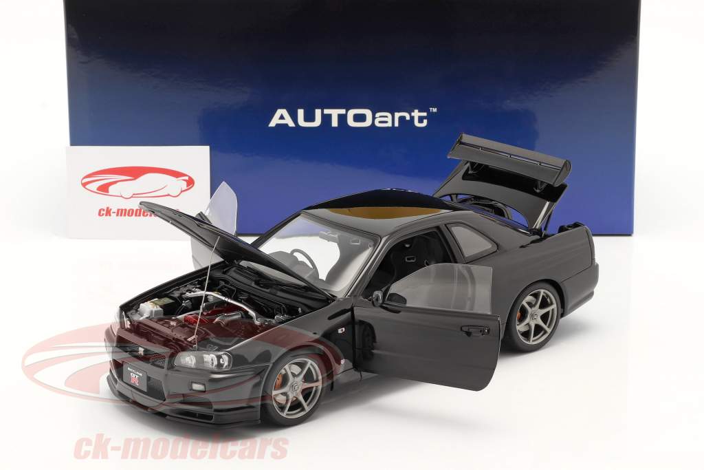 Nissan Skyline GT-R (R34) V-Spec II Год постройки 2001 жемчужно-черный 1:18 AUTOart