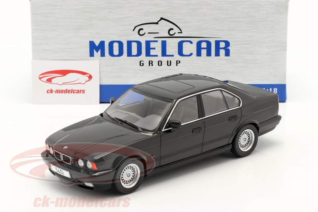 BMW 5er ряд (E34) Год постройки 1992 черный 1:18 ModelCar Group