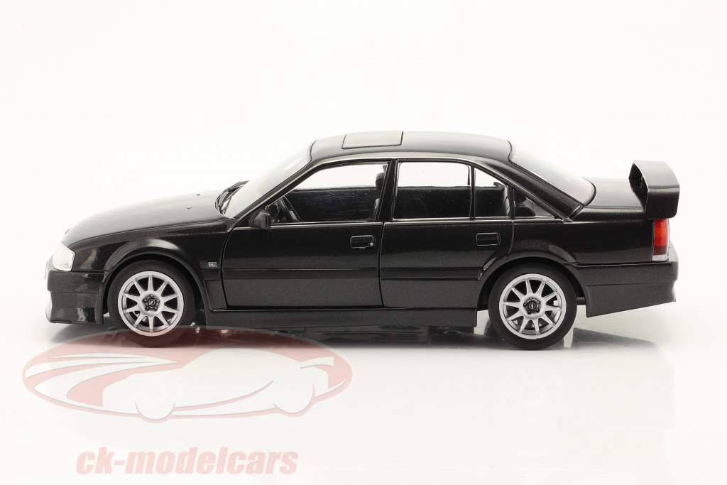 Opel Omega Evolution 500 Baujahr 1991 schwarz 1:24 WhiteBox
