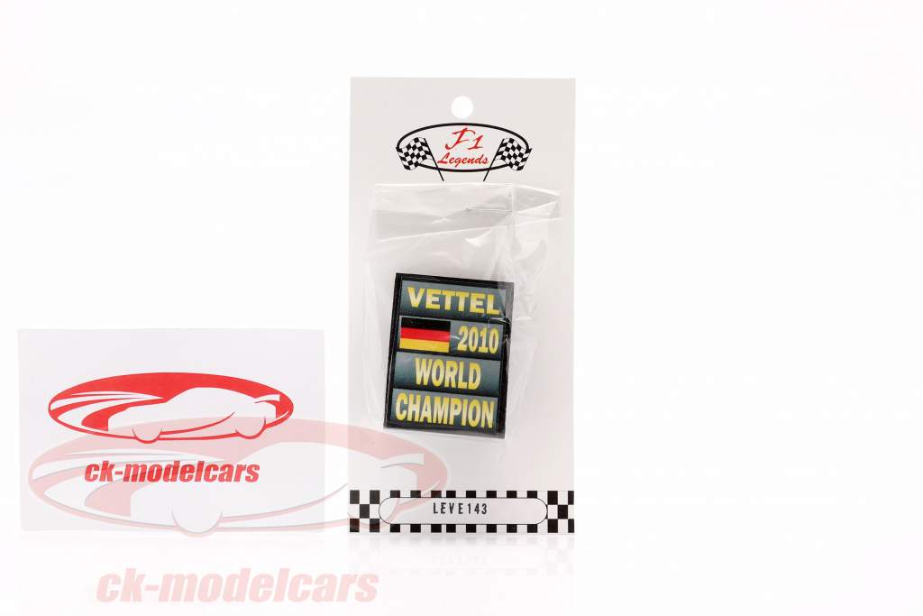 Sebastian Vettel fórmula 1 Campeón mundial 2010 Tablero de boxes 1:18 Cartrix