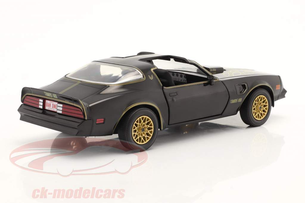 Pontiac Firebird TransAm Année de construction 1977 le noir / or 1:24 Greenlight