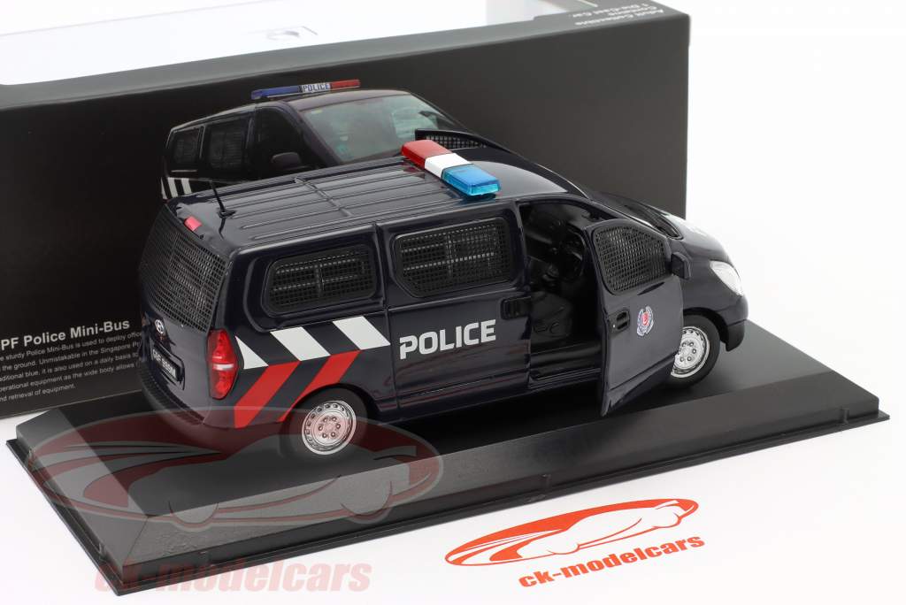 Mini-Bus SPF Polizei Singapur dunkelblau 1:43 Ixo