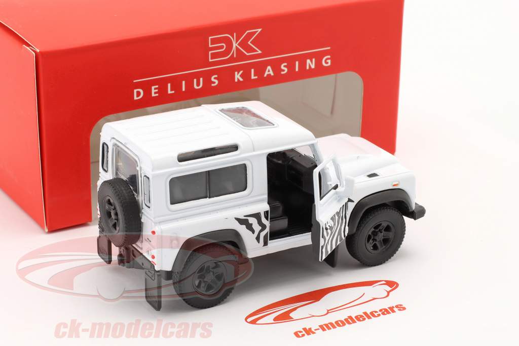 Set: Книга Landy forever & Land Rover Defender Белый / черный 1:38 Welly