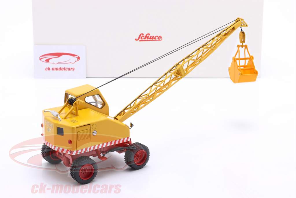 Fuchs graafmachine 301 met schep En sloopkogel geel 1:32 Schuco