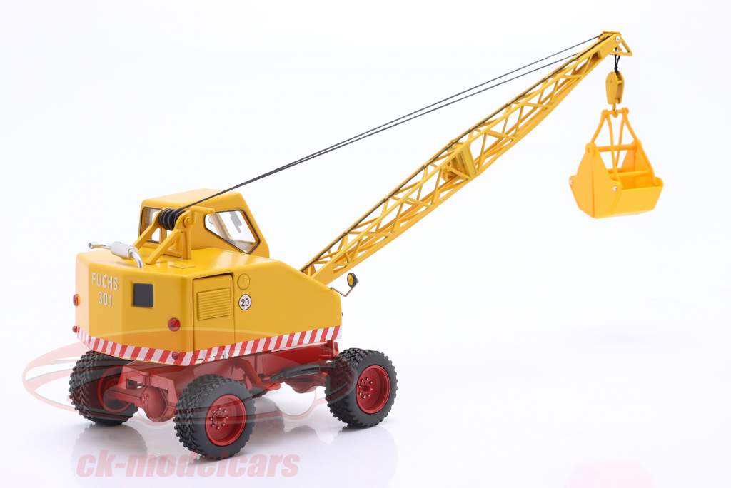 Fuchs graafmachine 301 met schep En sloopkogel geel 1:32 Schuco