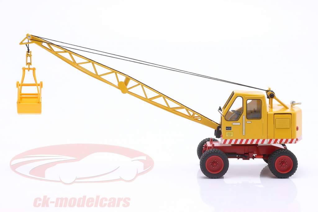 Fuchs 掘削機 301 と シャベル と 鋼球 黄色 1:32 Schuco