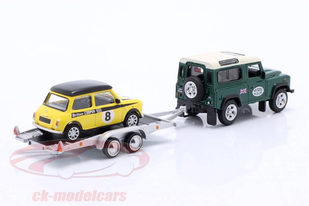 Land Rover Defender con trailer E Mini Cooper 1:64 Schuco