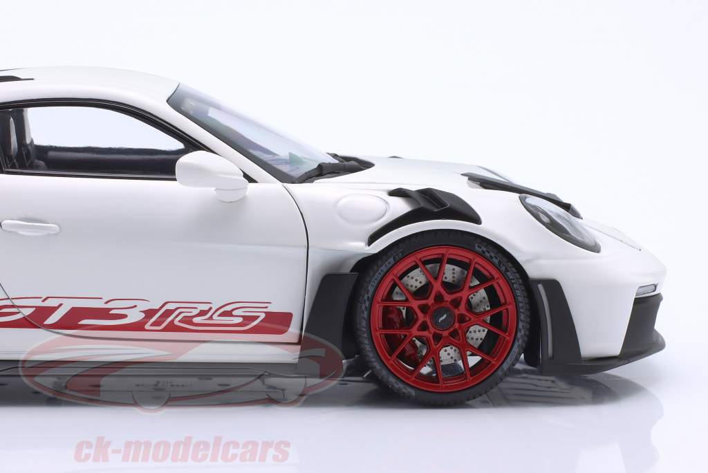 Porsche 911 (992) GT3 RS year 2022 white / red rims 1:18 Minichamps