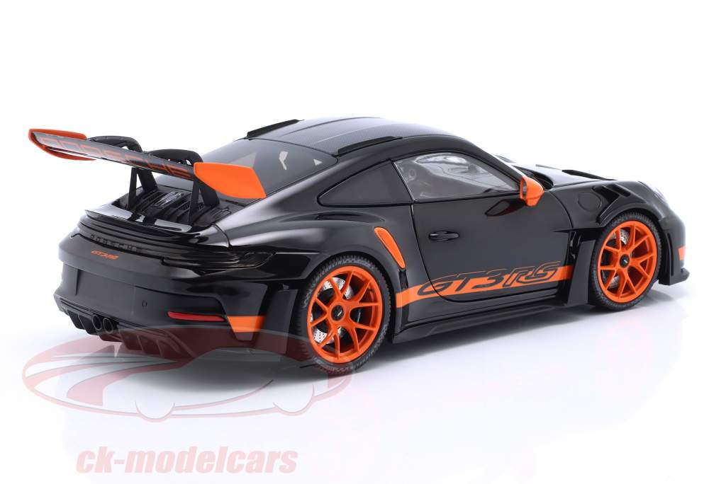 Porsche 911 (992) GT3 RS Année de construction 2022 noir / orange jantes 1:18 Minichamps