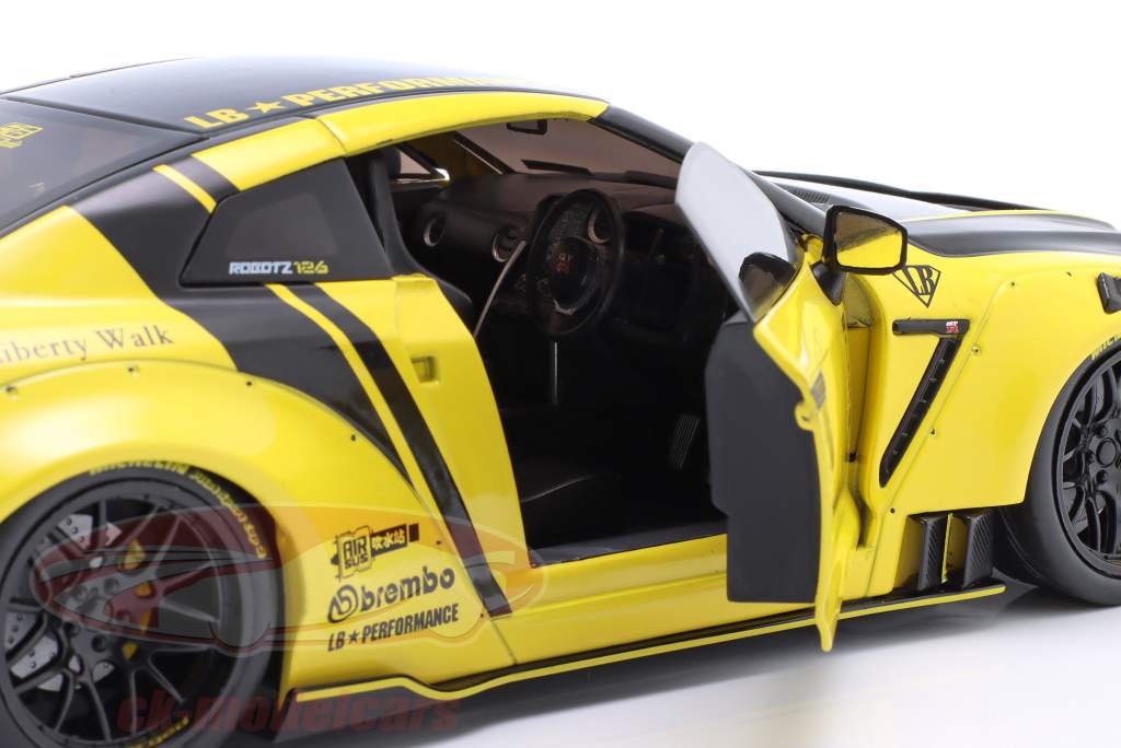 Nissan Skyline GT-R (R35) LBWK Body-Kit 2.0 gul / sort 1:18 Solido