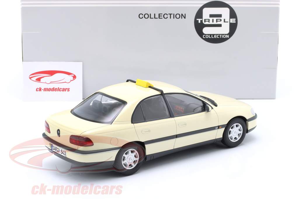 Opel Omega B taxa Tyskland Byggeår 1996 elfenben 1:18 Triple9