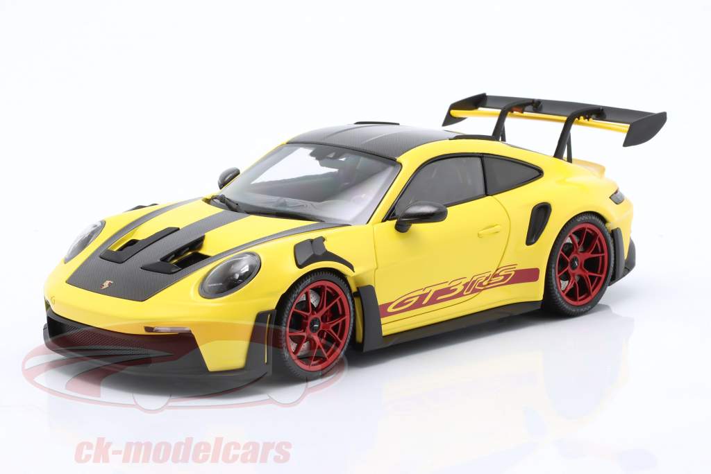 Porsche 911 (992) GT3 RS Forfait Weissach 2024 jaune / rouge jantes 1:18 Minichamps
