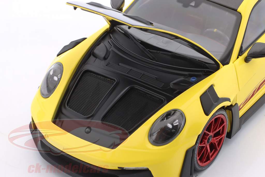 Porsche 911 (992) GT3 RS Forfait Weissach 2024 jaune / rouge jantes 1:18 Minichamps
